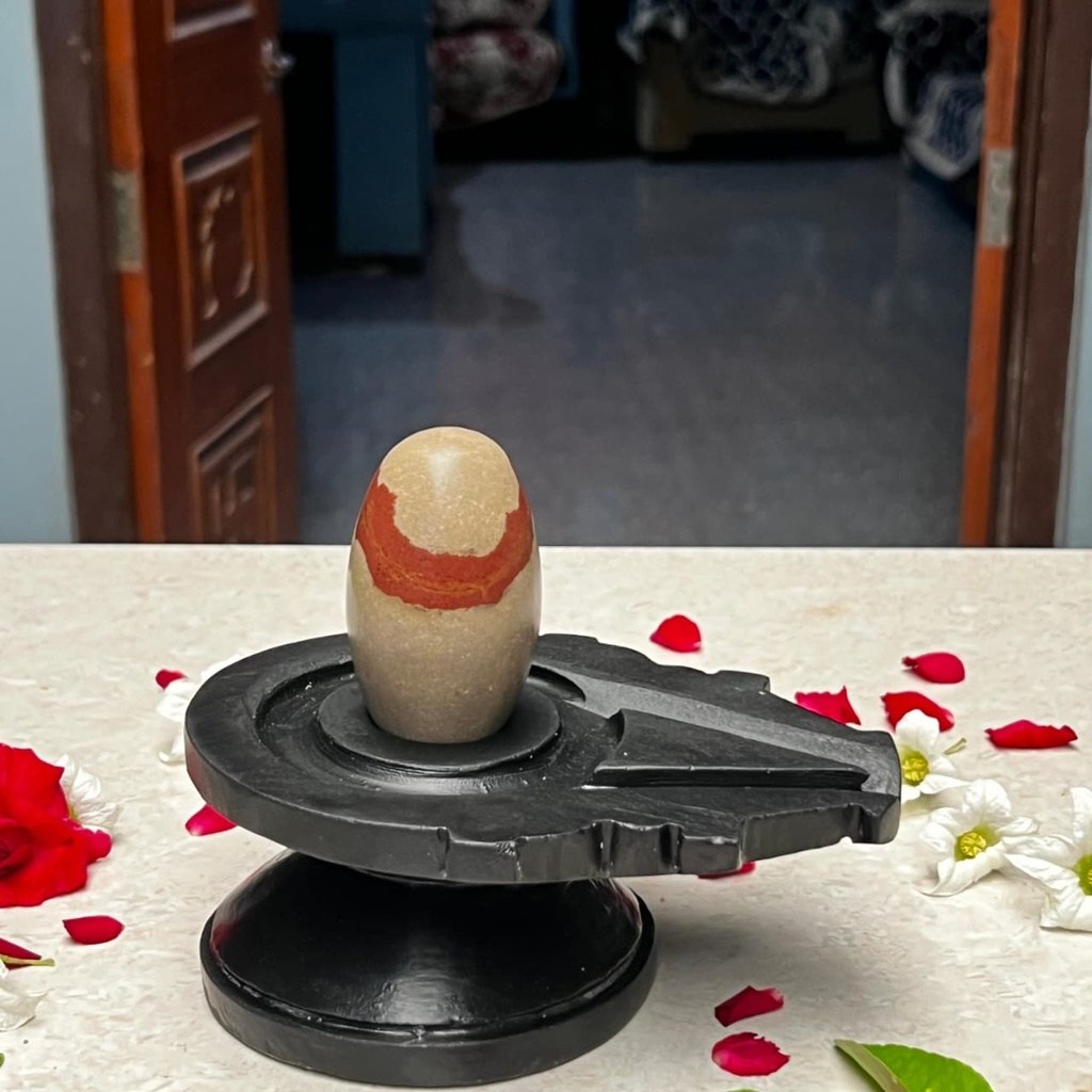 3 Inch Natural Akrati Narmadeshwar Shivling with 6 Inch Black Damru Jaladhari, 3″ height · 6″ Damru Jaladhari