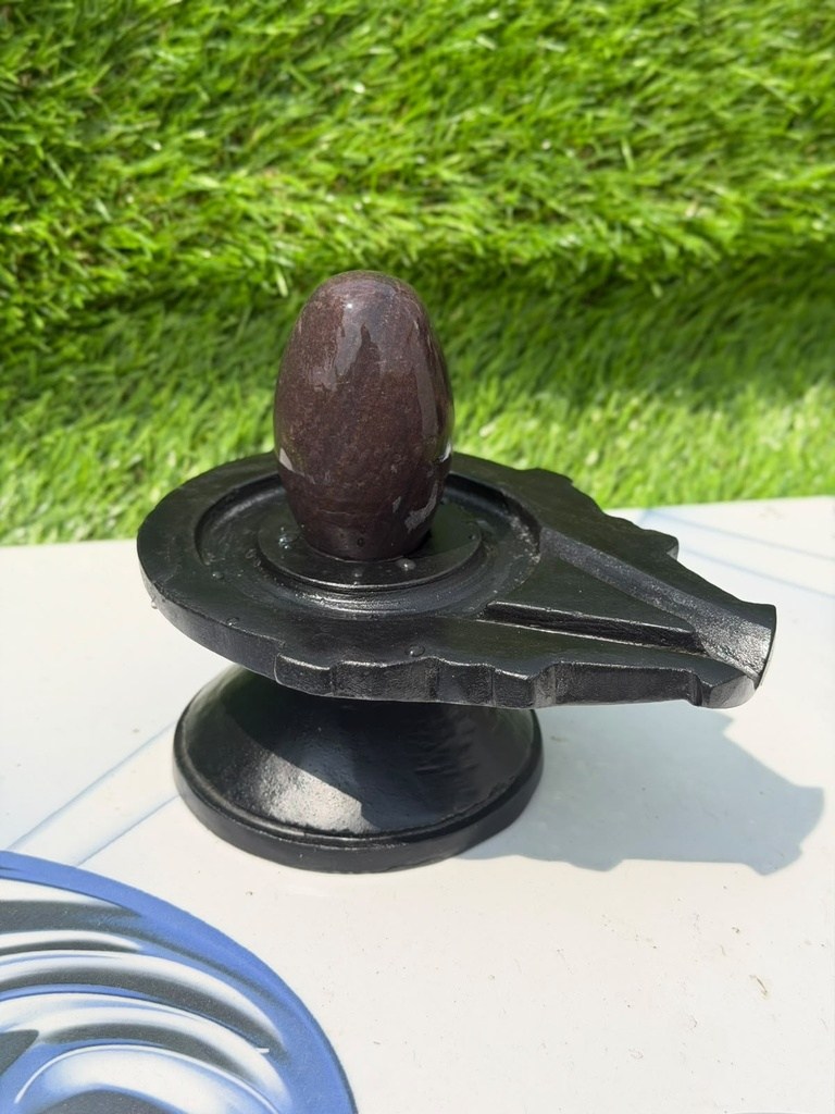 3 Inch Dark Brown Narmadeshwar Shivling with 6 Inch Black Damru Jaladhari, 3″ height · 6″ Damru Jaladhari