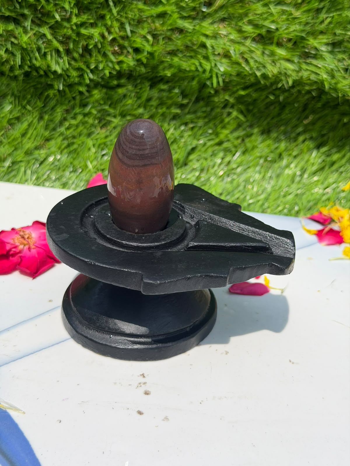 2-inch Narmadeshwar Shivling · Banded Crown and Rust Body — Original product photo