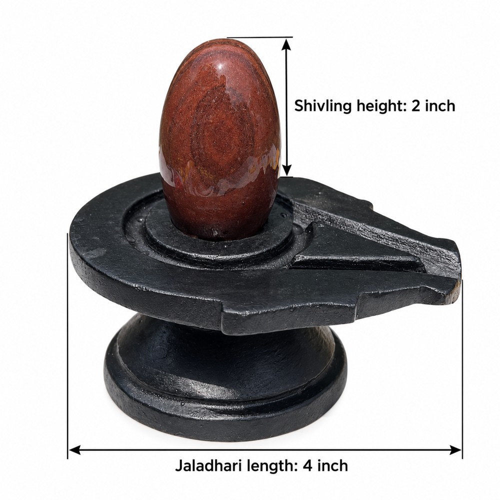 2-inch Narmadeshwar Shivling · Warm Rust Oval — 2-inch height and 4-inch Jaladhari length
